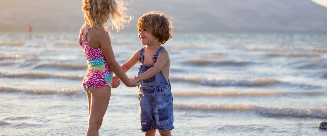 Kids on villa holiday by beachfront