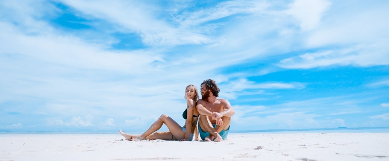 Couple sitting on beach