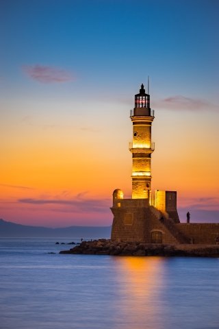 Overlooking Chania lighthouse at night, Crete, Greece