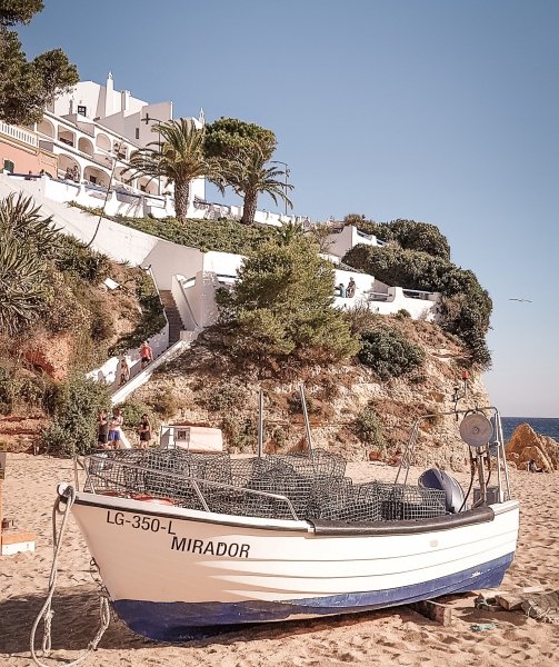 Boat on Carvoeiro beach, Algarve, Portugal