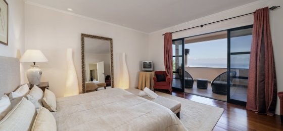 15_-_our_madeira_-_villa_luz_-_master_bedroom.jpg Book a villa in Madeira
