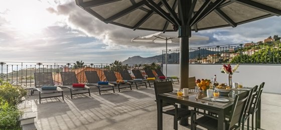 4_-_our_madeira_-_belair_-_chairs_and_table.jpg Holiday villas in Portugal