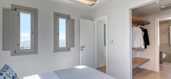 21_master_bedrrom_top_floor_wardrobe.jpg Holiday home in Mykonos villa booking