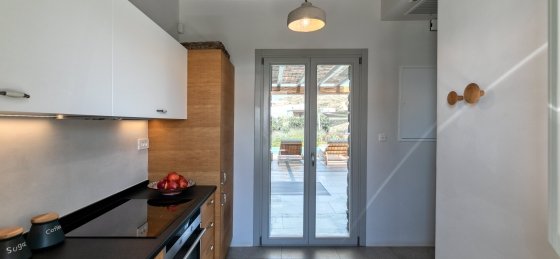 28_kitchen_pool_view.jpg Villa rentals in Greece