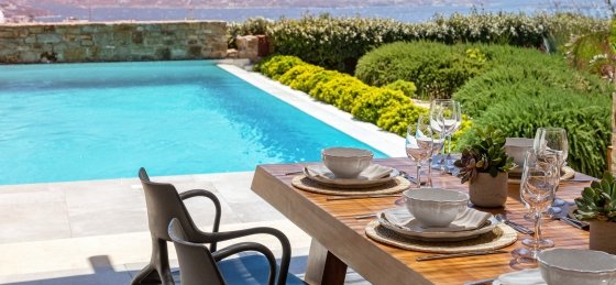 5_dining_by_the_pool_sea_view.jpg Book a villa holiday in Mykonos