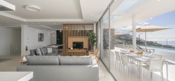 10_ourmadeira_villas_in_madeira_ocean_panorama_living_area_and_outdoor.jpg Book a villa holiday in Madeira