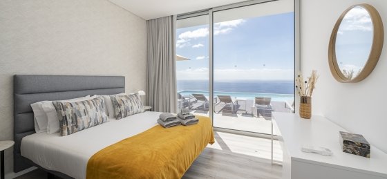 18_ourmadeira_villas_in_madeira_ocean_panorama_bedroom_1_and_view.jpg Book a villa holiday in Calheta