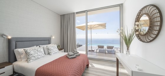 21_ourmadeira_villas_in_madeira_ocean_panorama_bedroom_2.jpg Book a villa in Portugal