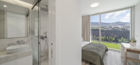 25_ourmadeira_villas_in_madeira_ocean_panorama_bedroom_3_and_en-suite.jpg Book a villa in Madeira