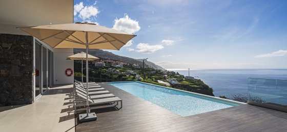 8_ourmadeira_villas_in_madeira_ocean_panorama_exterior_pool_and_view.jpg Holiday home in Portugal villa booking