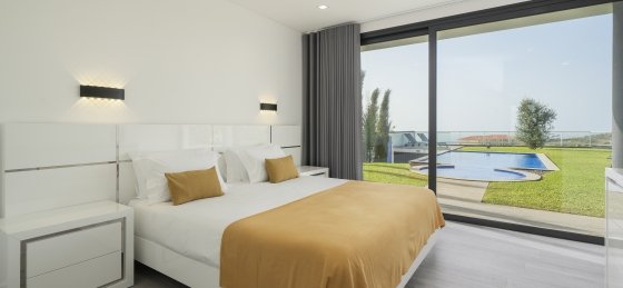 ourmadeira_villas_in_madeira_-_ocean_sunset_villa_-_masterbedroom_and_view.jpg Villa holidays in Madeira