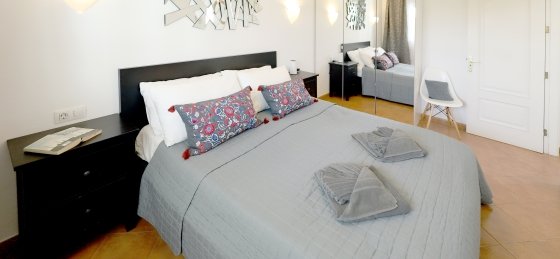 antares-bedroom_1-2_main_house.jpg Book a villa in Puerto del Carmen